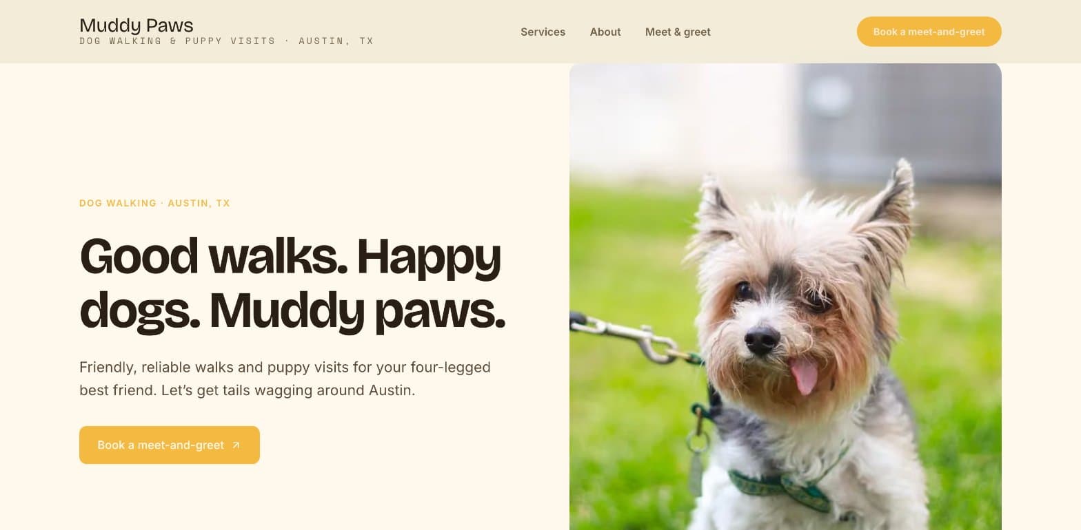 The Muddy Paws home page: "Good walks. Happy dogs. Muddy paws." in a bold font on a cream background, a meet-and-greet button, and a photo of a small dog on a lead